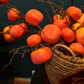 54CM Tall Artificial Flower Arrangement Realistic Persimmon In Rattan Basket (ARBA1)